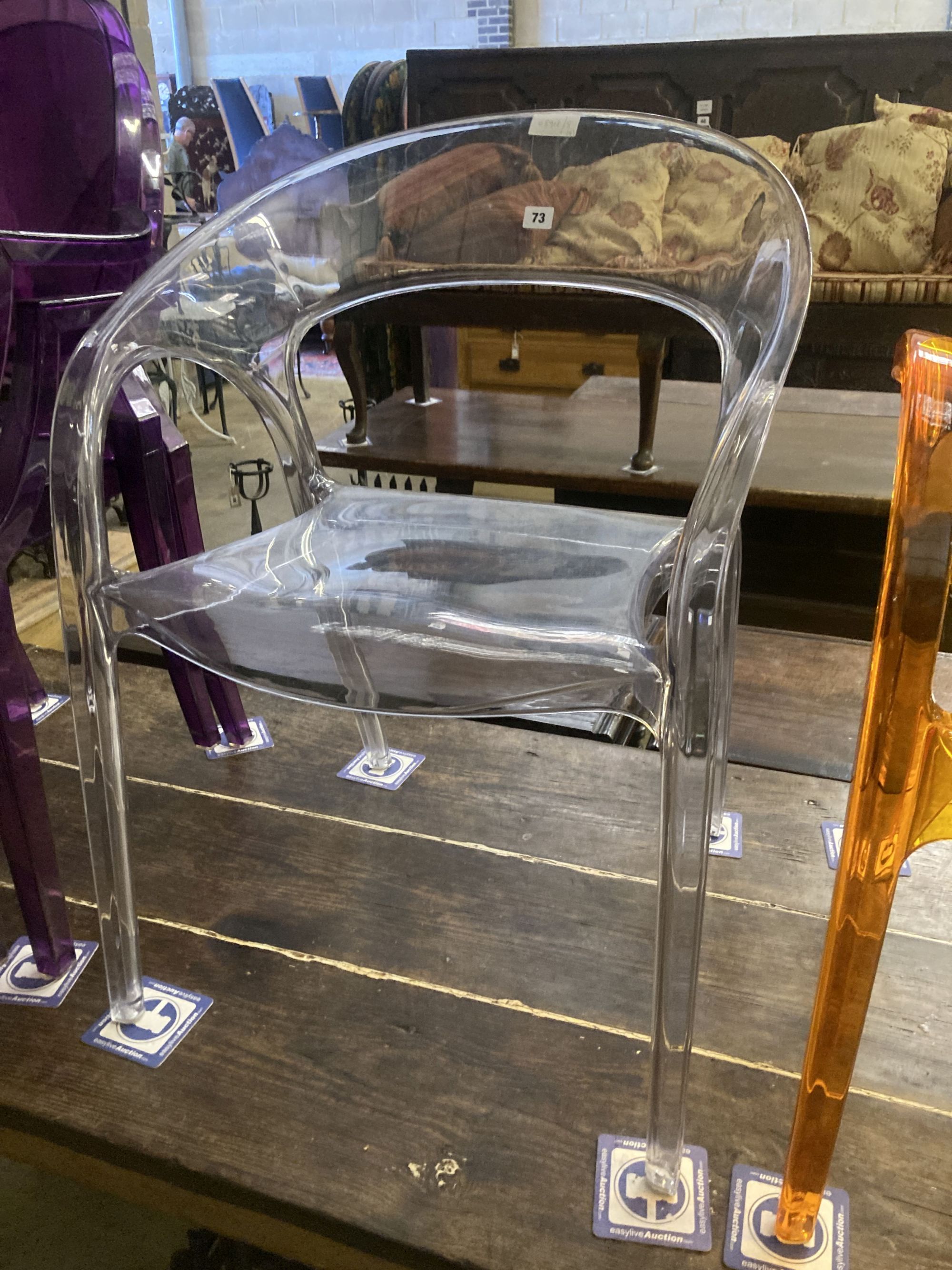 Four Philippe Starck style coloured and clear perspex chairs, largest 58cm, depth 50cm, height 83cm